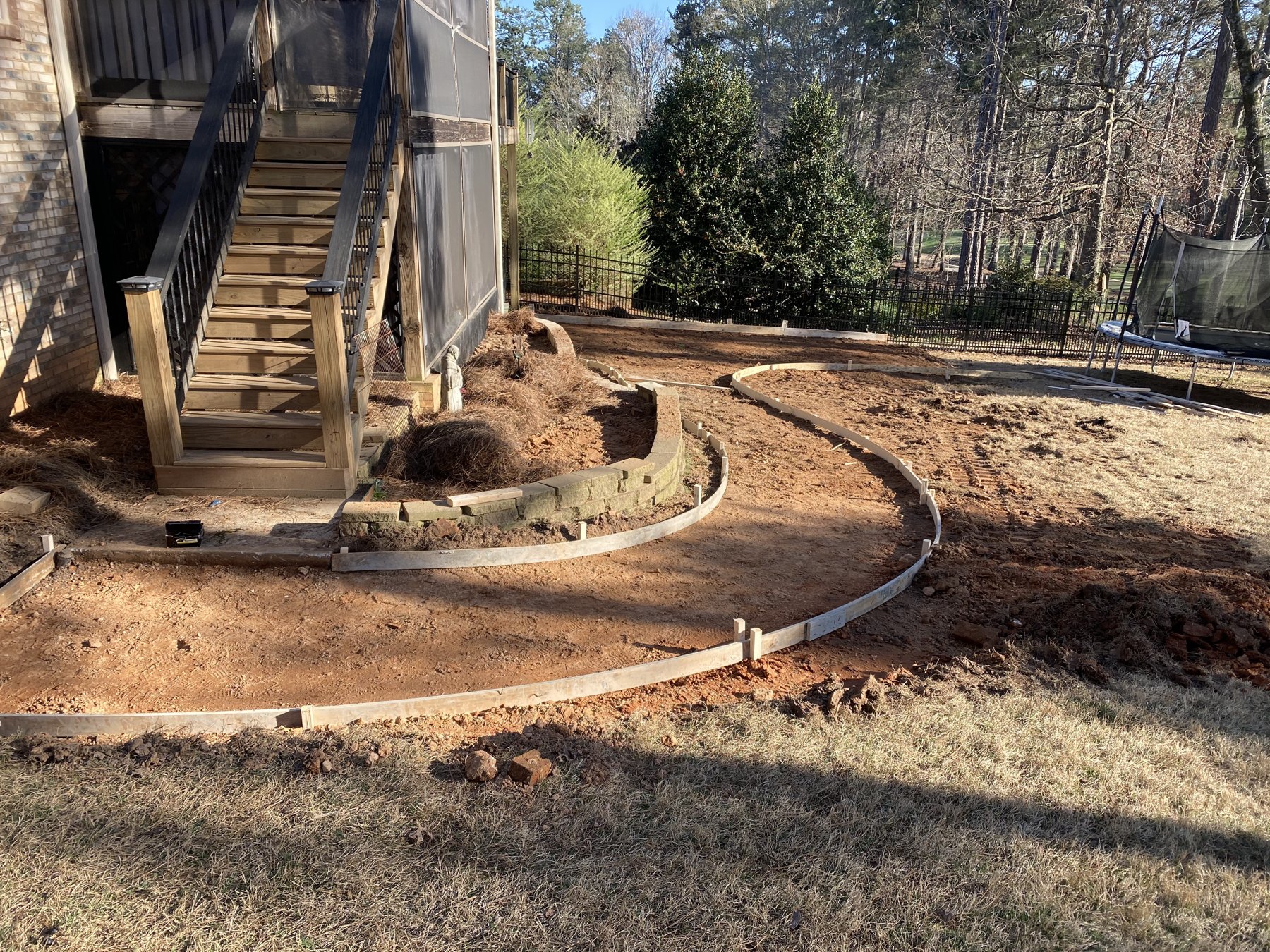 Curved walkway before concrete work photo 1 Curved walkway before photo 1 showing walkway concrete preparation by Colquitt Concrete in Georgia