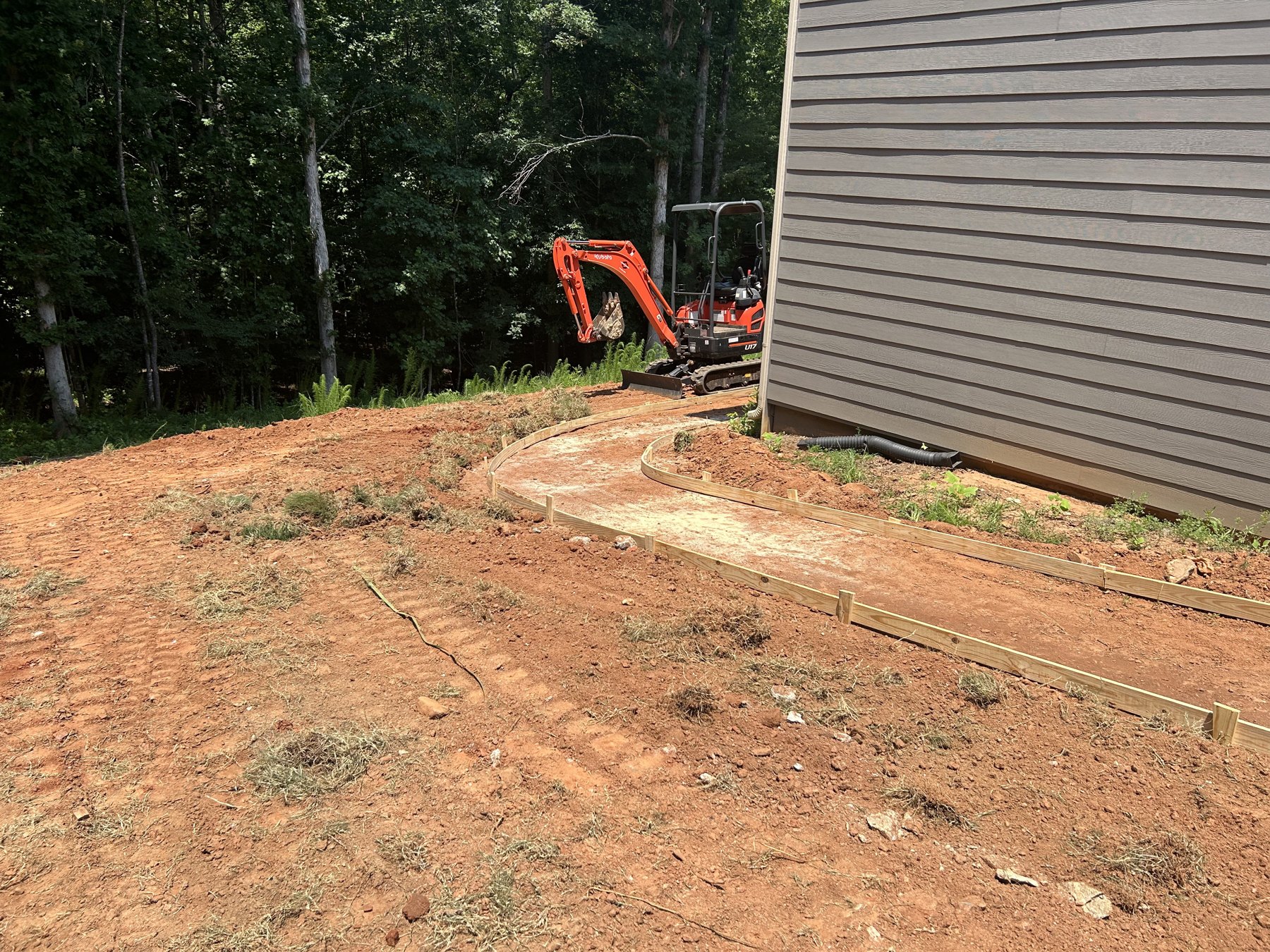 Garage walkway approach before concrete work photo 3 Garage walkway approach before photo 3 showing walkway concrete preparation by Colquitt Concrete in Georgia