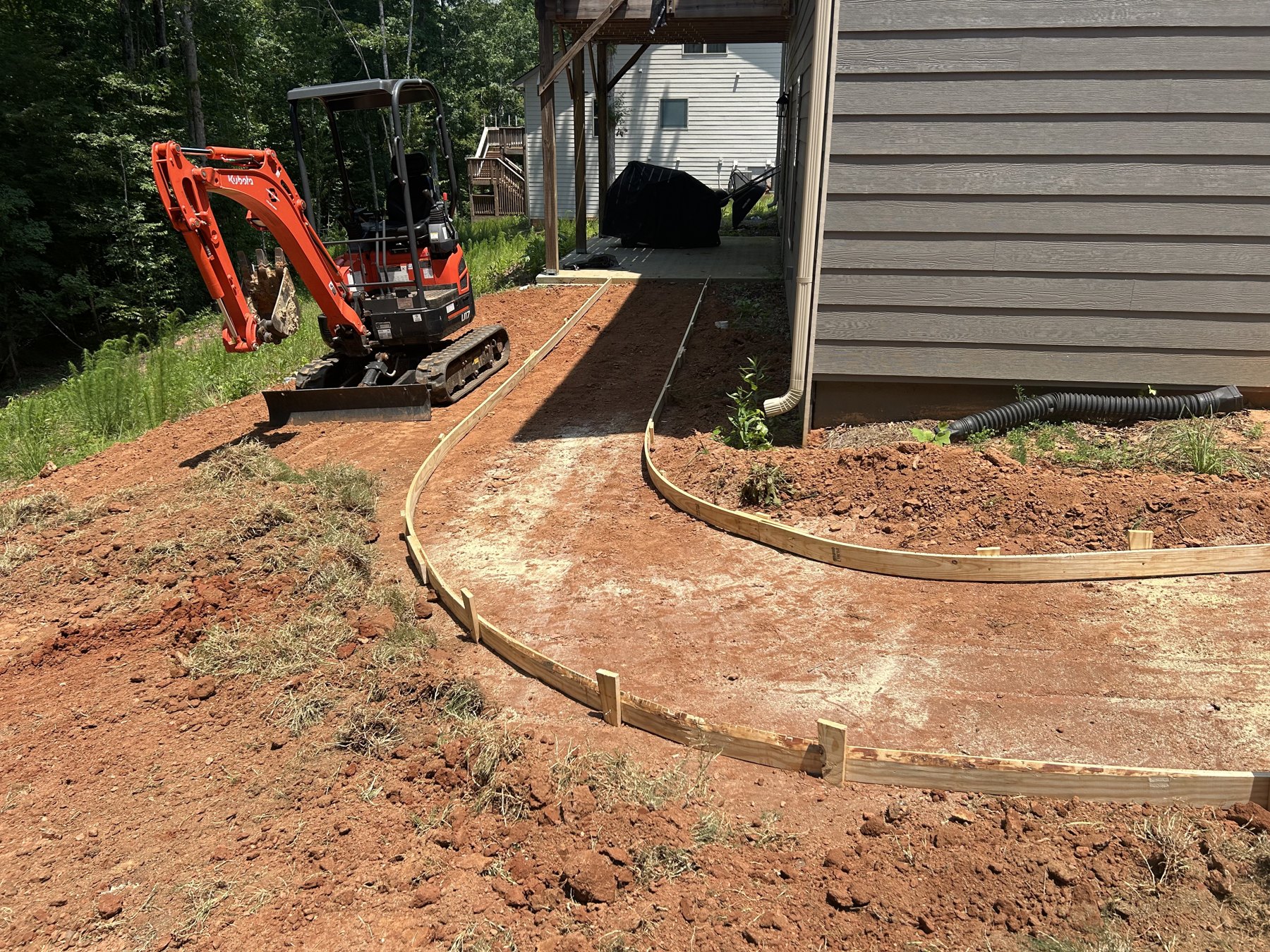 Garage walkway approach before concrete work photo 4 Garage walkway approach before photo 4 showing walkway concrete preparation by Colquitt Concrete in Georgia