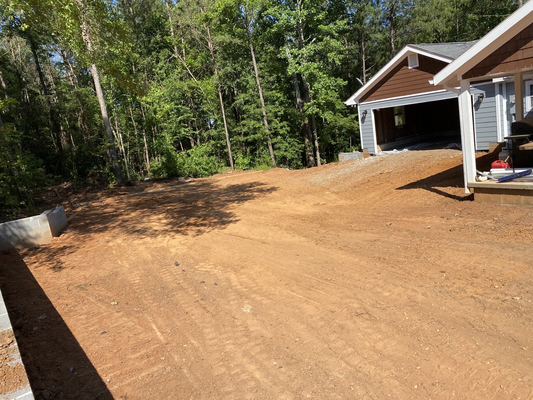 Large residential drive before photo 2 showing driveway concrete preparation by Colquitt Concrete in Georgia