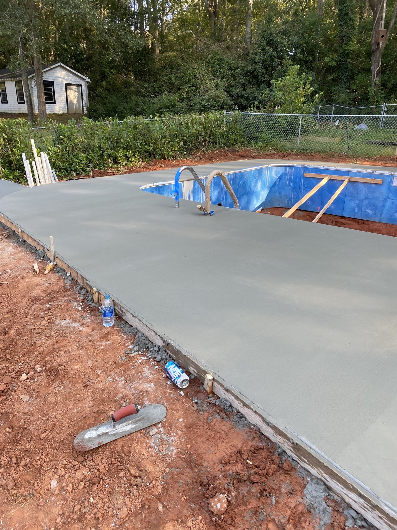 Pool deck extension finished concrete photo 4 Pool deck extension after photo 4 showing finished pool deck concrete work by Colquitt Concrete in Georgia