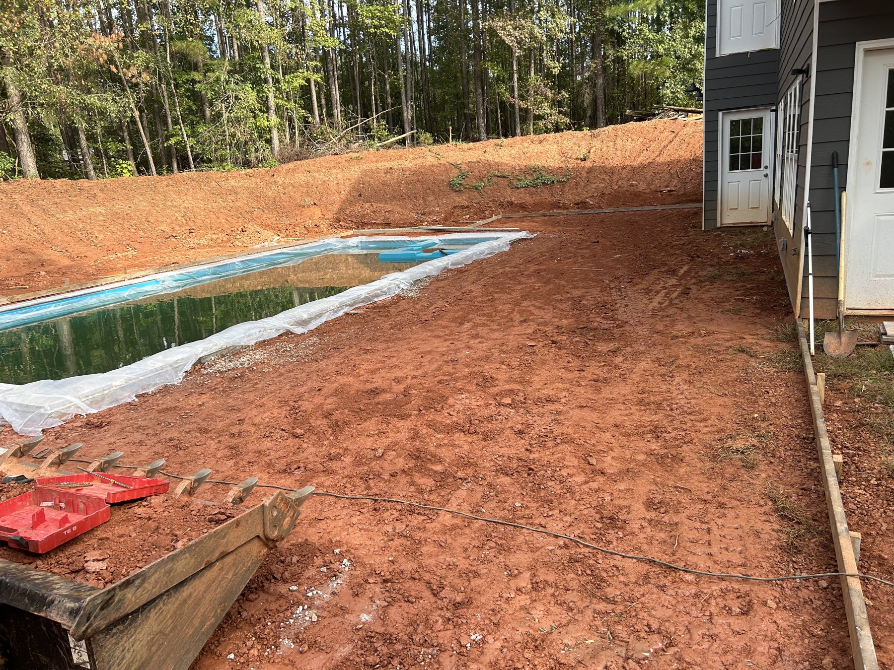 Pool deck extension before concrete work photo 3 Pool deck extension before photo 3 showing pool deck concrete preparation by Colquitt Concrete in Georgia