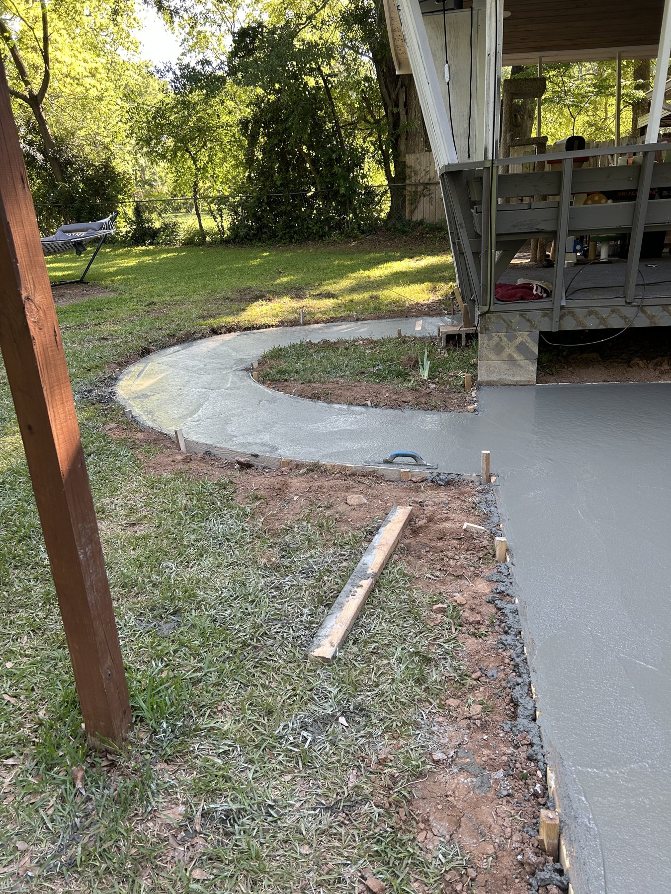 Rear patio and walk after photo 2 showing finished patio and walkway concrete work by Colquitt Concrete in Georgia