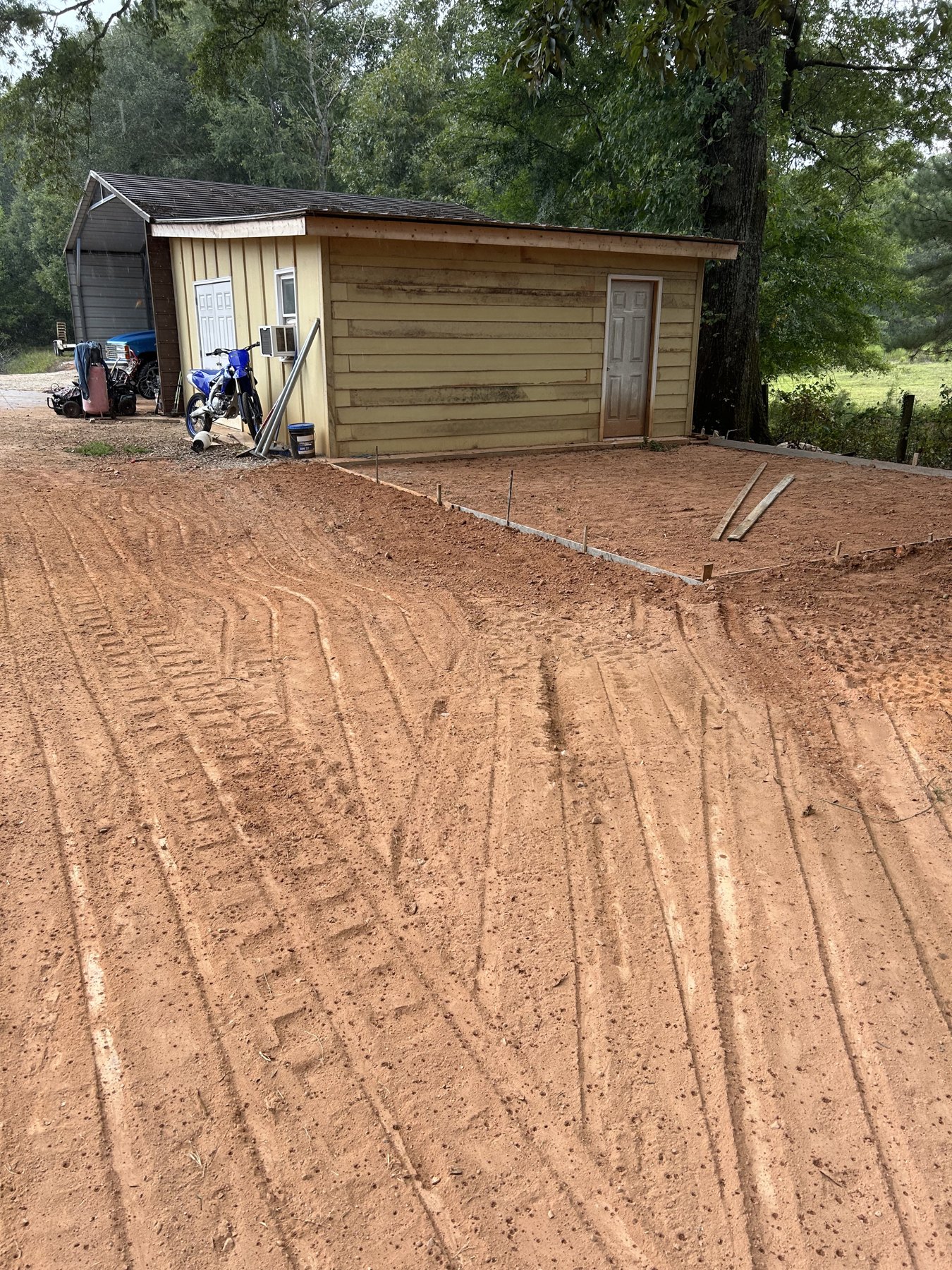 Concrete demolition and site preparation before a replacement slab