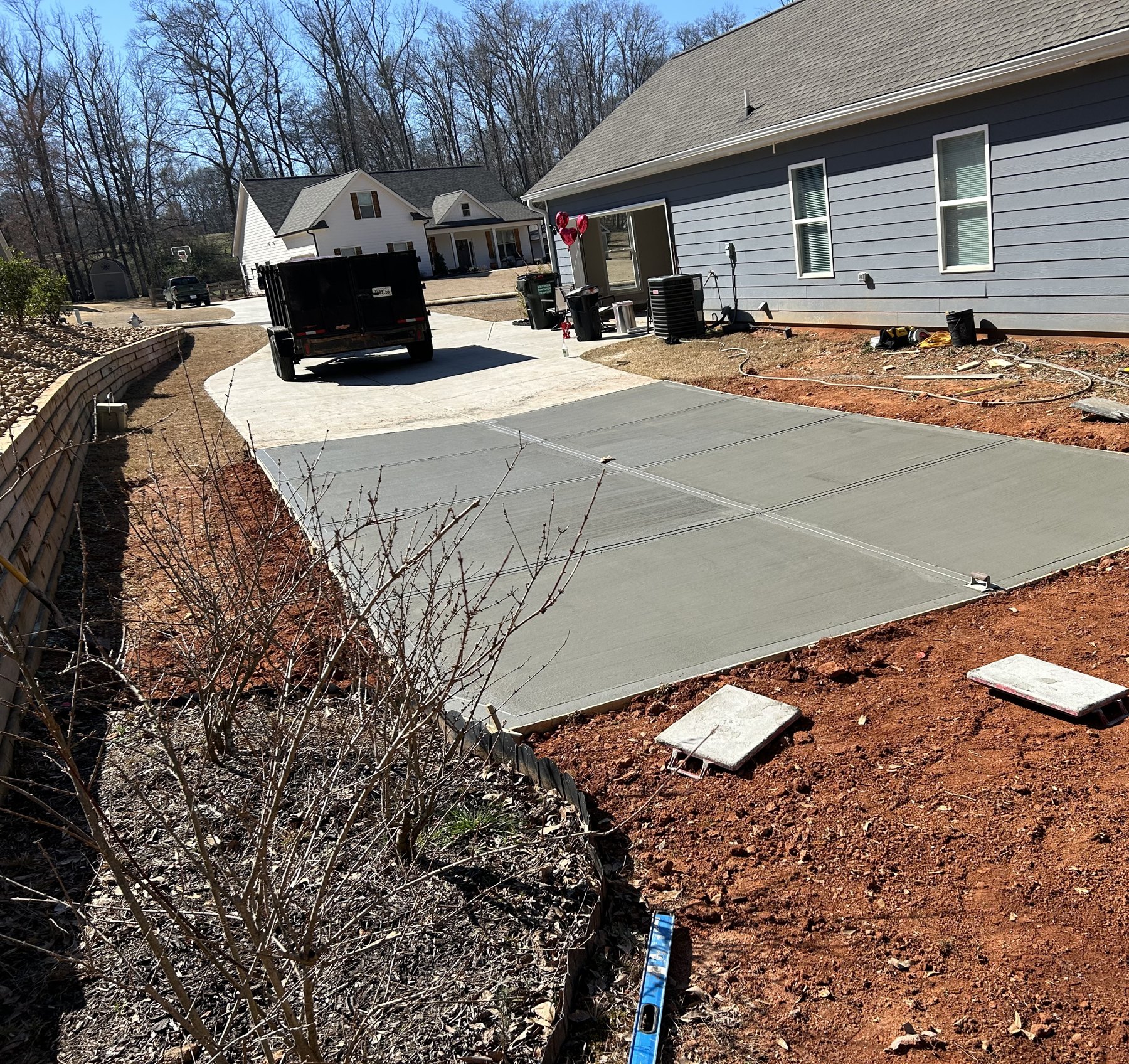 Side driveway extension finished concrete photo 5 Side driveway extension after photo 5 showing finished driveway concrete work by Colquitt Concrete in Georgia